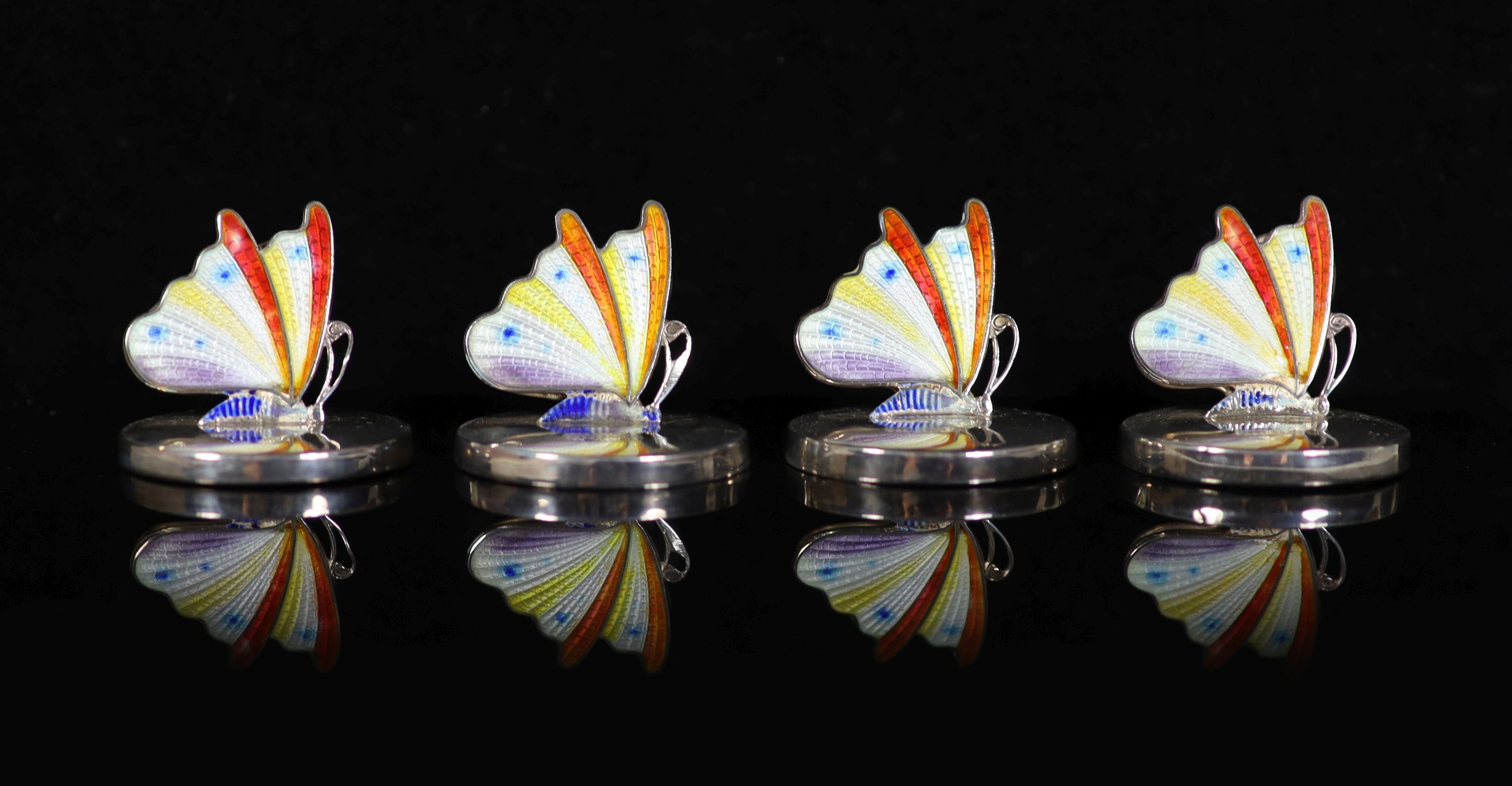 A cased set of four George V novelty silver and enamel oval menu holders, modelled as butterflies, Levy & Salaman